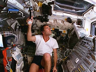 STS-84 Mission Specialist Jean-Francois Clervoy exercises on the flight deck bicycle ergometer. 